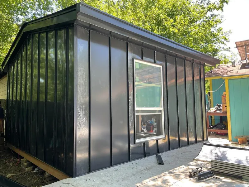 Black standing seam metal wall panels for Roof Inspection in Kennett